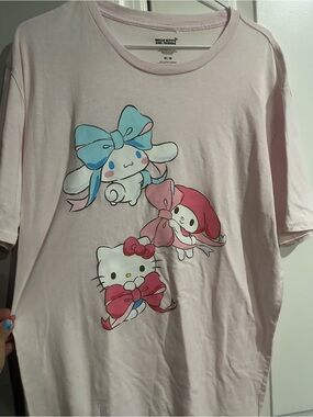 Sanrio Light Pink Hello Kitty & Friends Graphic Tee with Blue and Red Accents